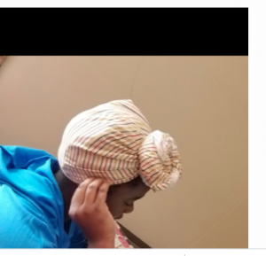 4th grade girl head down looking at loptop